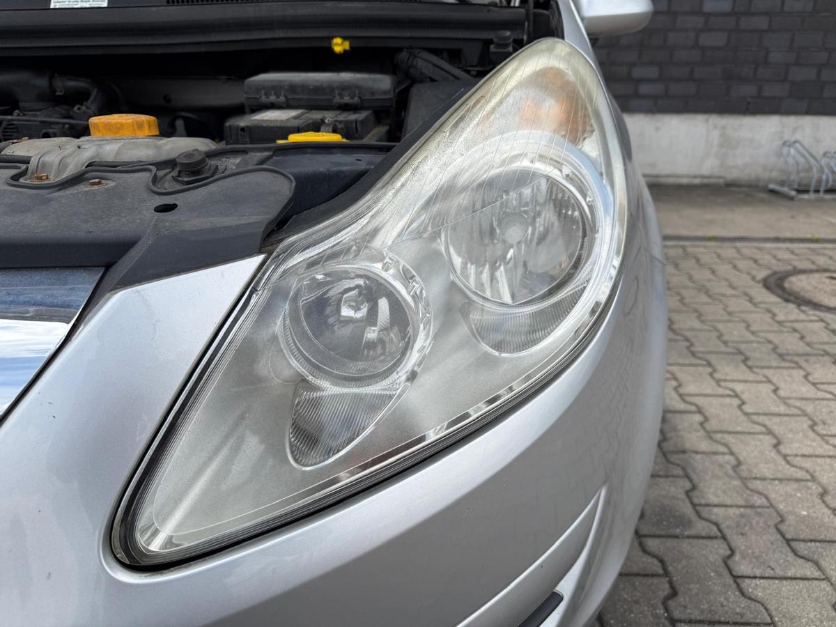 Opel Corsa D original Scheinwerfer links Halogen 93189357 BJ08